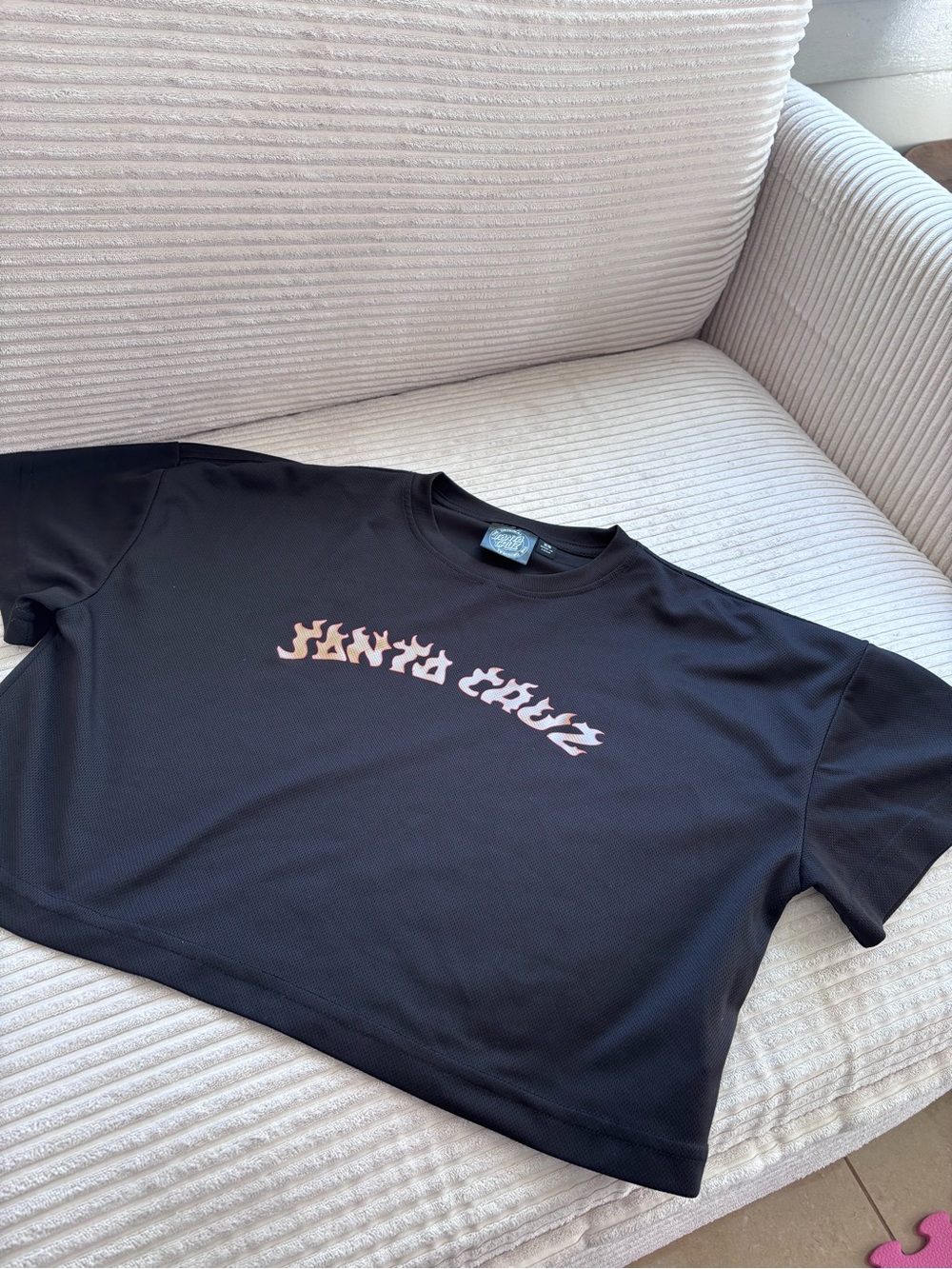 Cropped Santa Cruz Skateboards Black Tee with Red-Orange Flame Logo